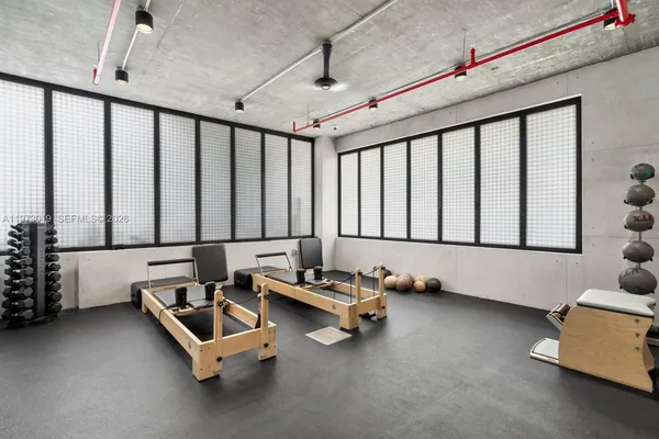 a view of a room with gym equipment