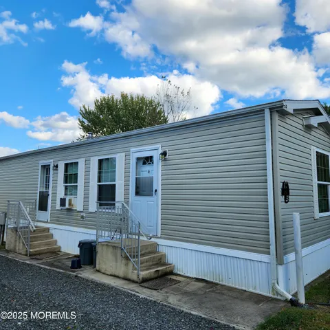 a front view of a house with balcony