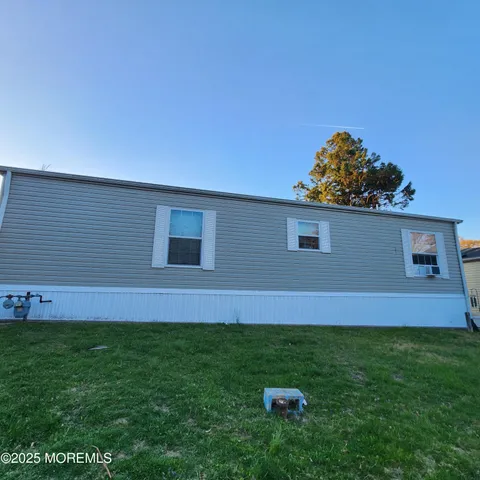 a view of yard with an outdoor space