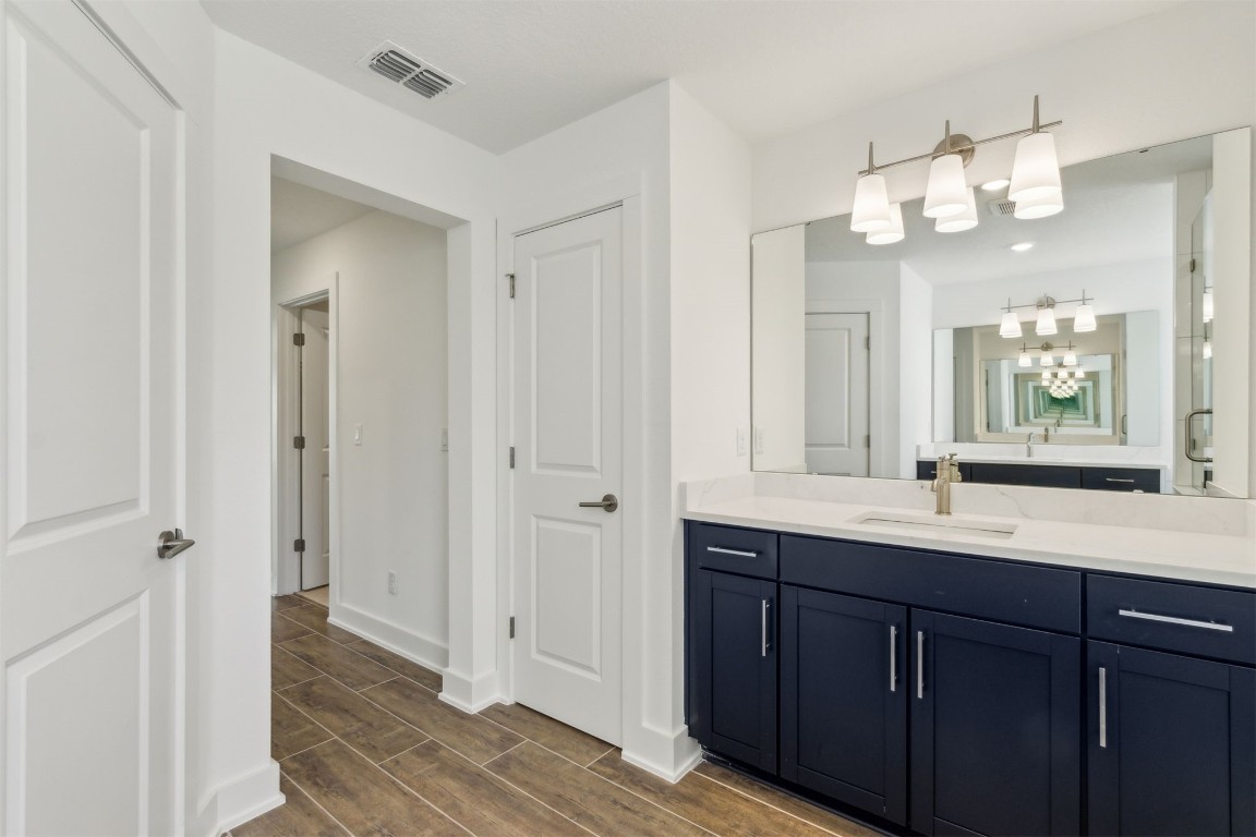 96100 Pirates Bluff Road Yulee, FL 32097 - Photo 26 of 39 a bathroom with a sink and a mirror