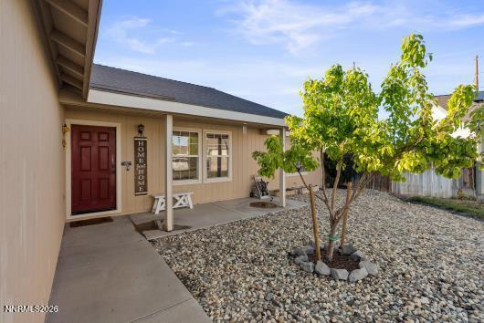 552 Spur Court Fernley, NV 89408 - Photo 5 of 46 a backyard of a house with table and chairs