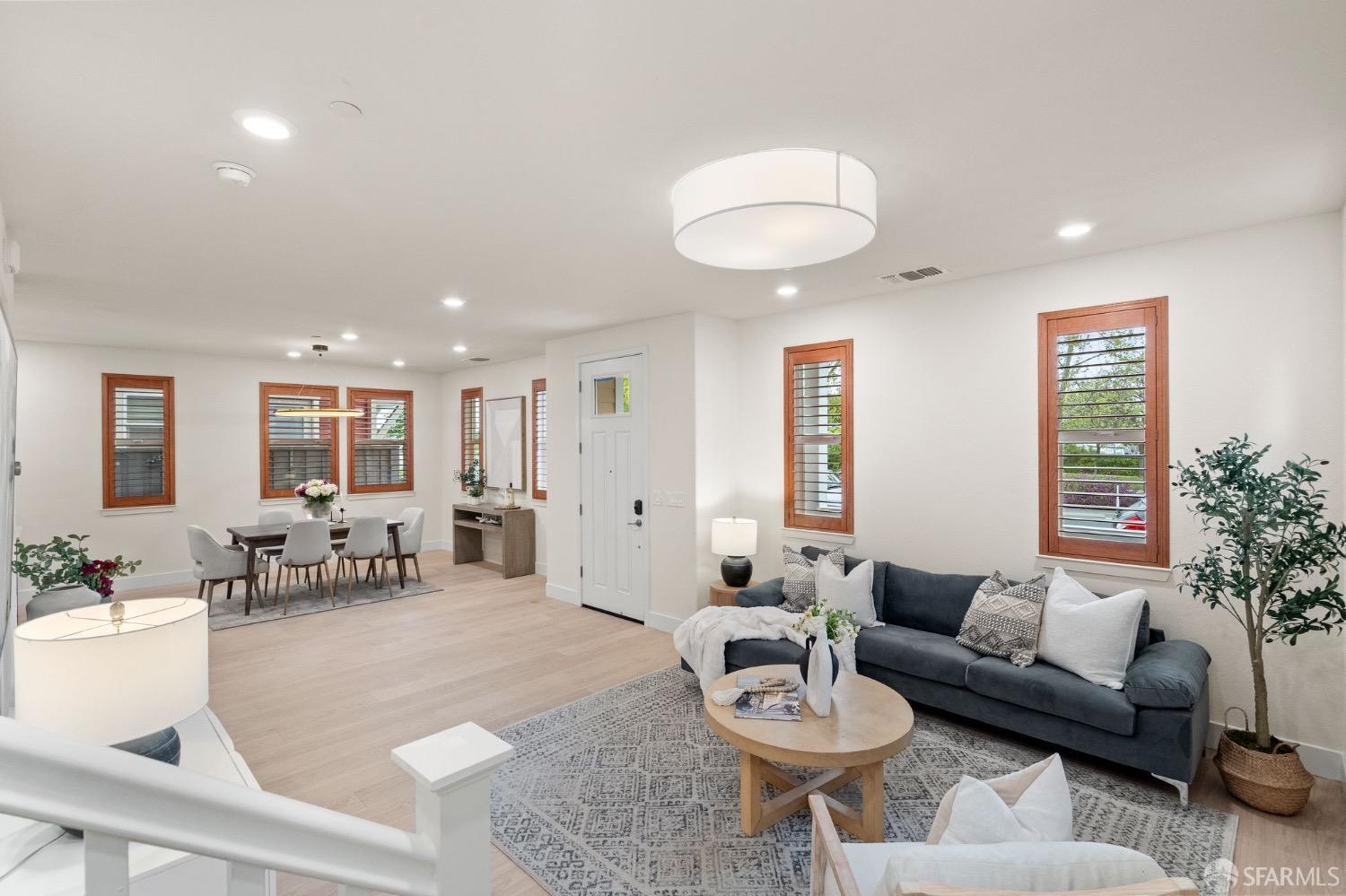 1552 Clement Avenue Alameda, CA 94501 - Photo 5 of 23 a living room with furniture and wooden floor
