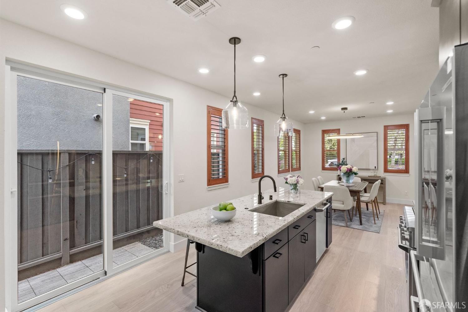 1552 Clement Avenue Alameda, CA 94501 - Photo 9 of 23 a large kitchen with lots of counter space and furniture