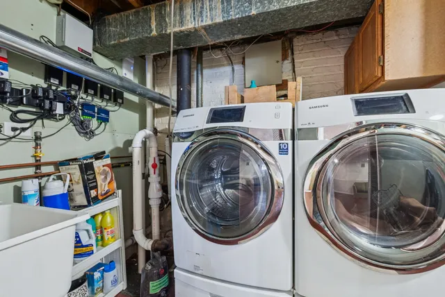 a utility room with dryer and washer