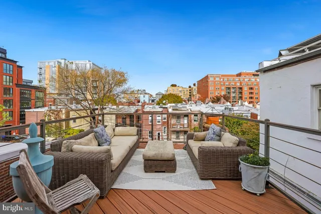 a view of a terrace with seating space