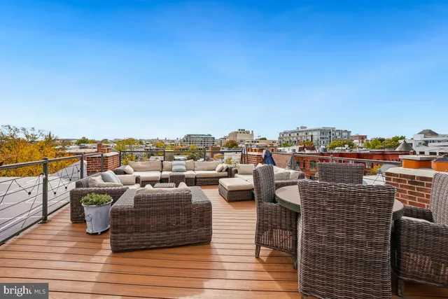 a view of a terrace with furniture