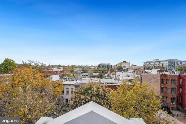 a view of a balcony with chair and the floor