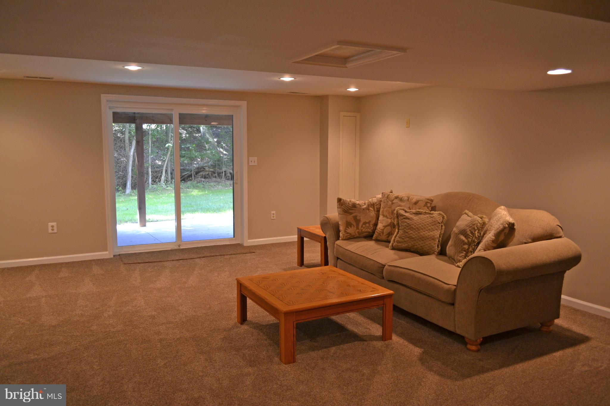2012 Merrifields Drive Silver Spring, MD 20906 - Photo 20 of 30 Recreation room with new sliding glass doors