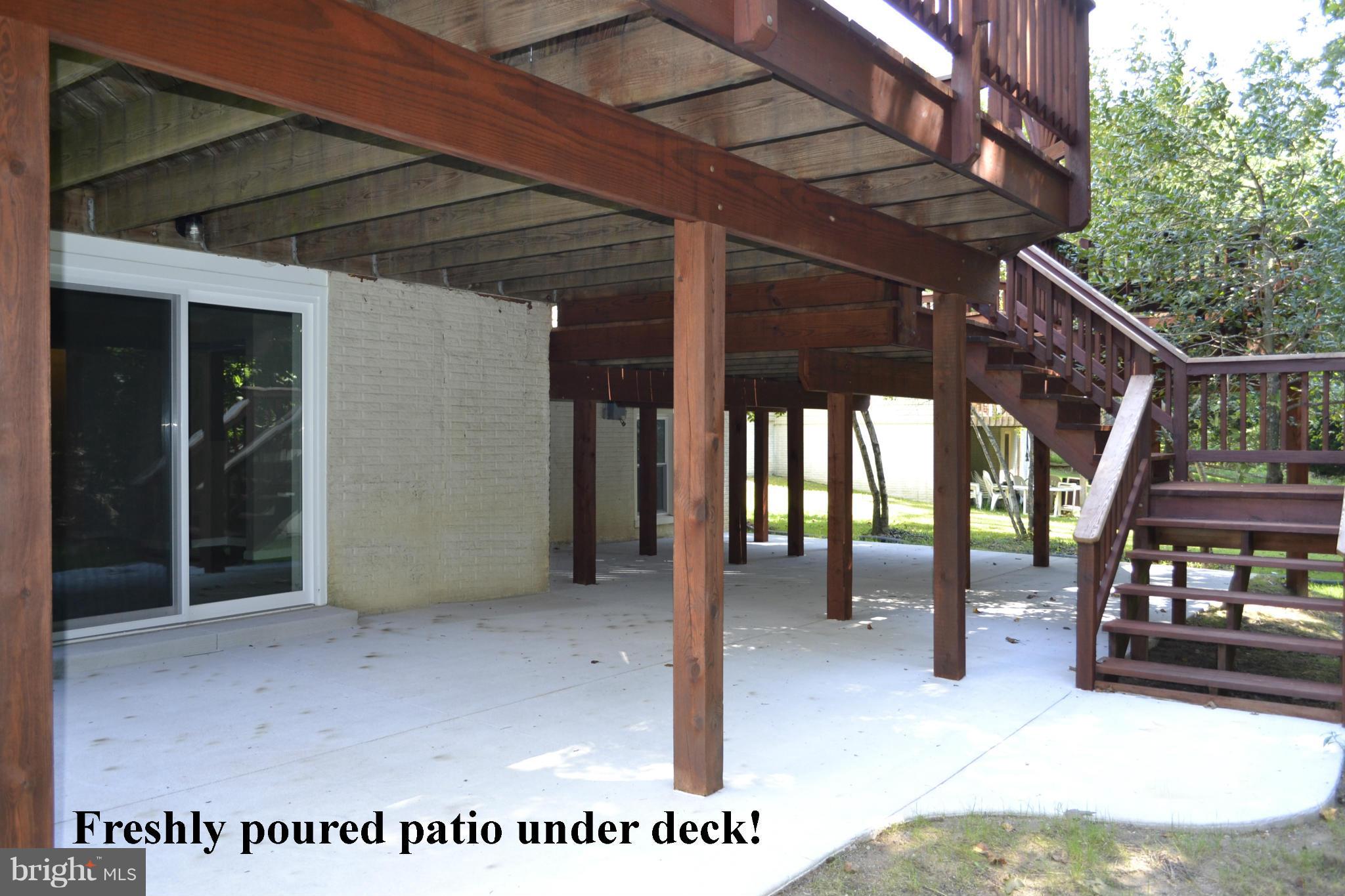 2012 Merrifields Drive Silver Spring, MD 20906 - Photo 29 of 30 Newly poured concrete patio under deck