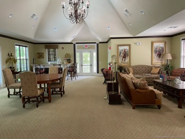 a view of a livingroom with furniture window and outside view
