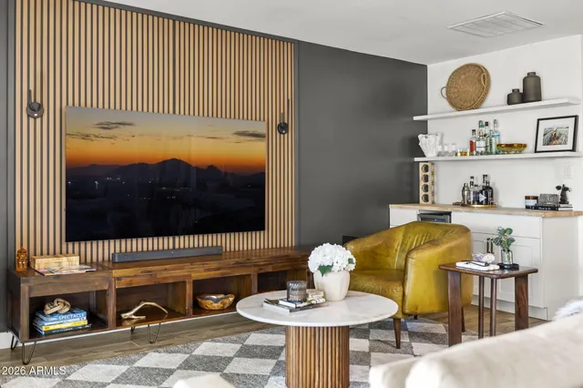 a kitchen with a refrigerator and cabinets