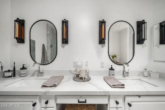 a bathroom with a shower and a bath tub