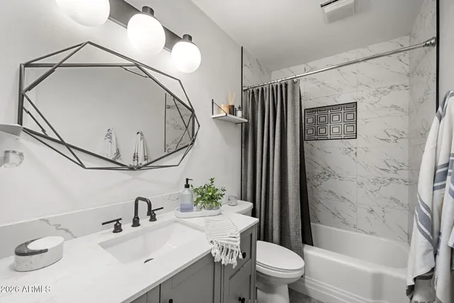 a view of a patio with table and chairs potted plants