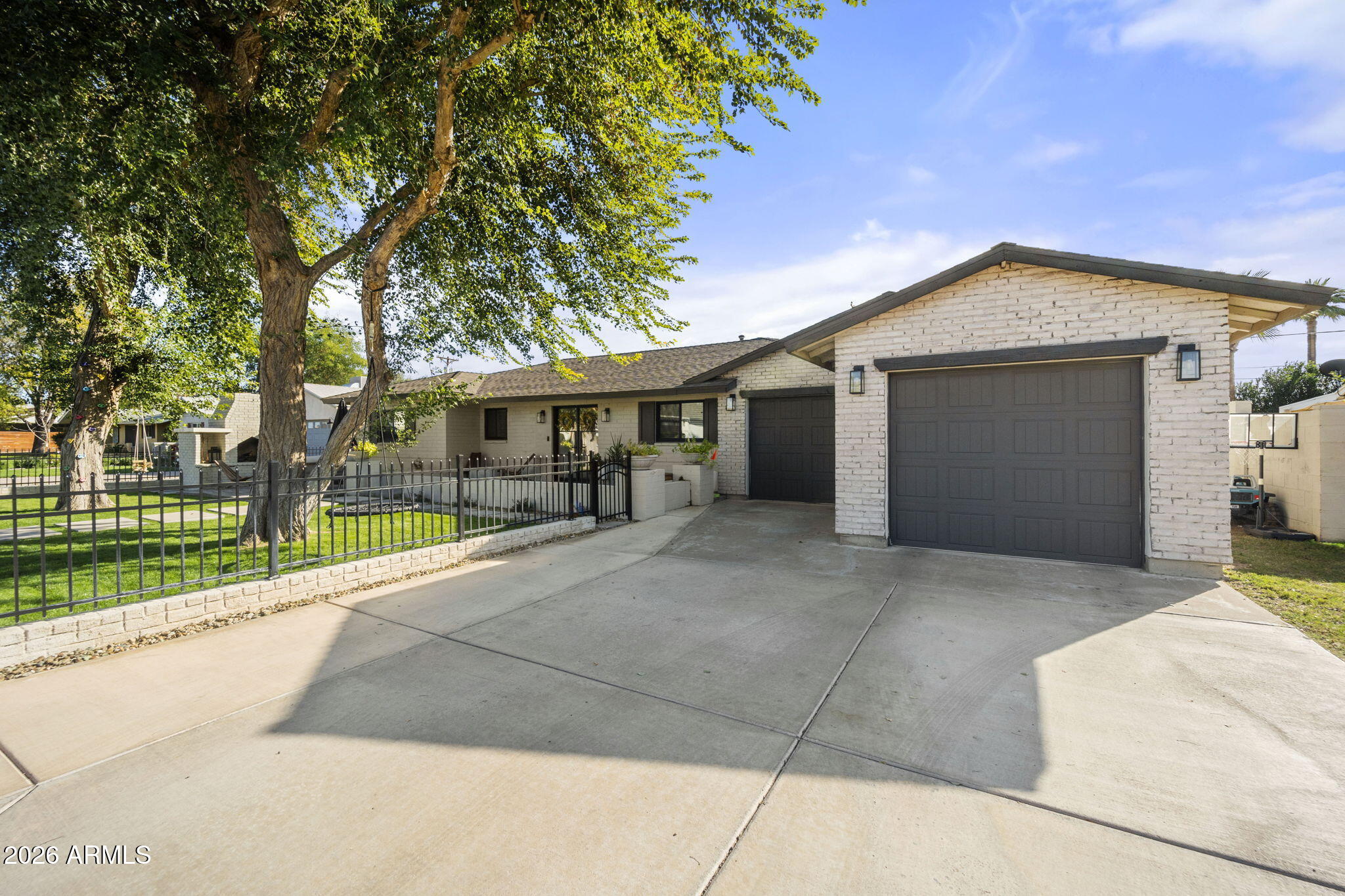 4215 East Flower Street Phoenix, AZ 85018 - Photo 39 of 39 a view of house and outdoor space