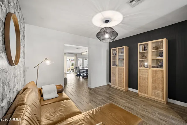 a view of living room and kitchen with furniture