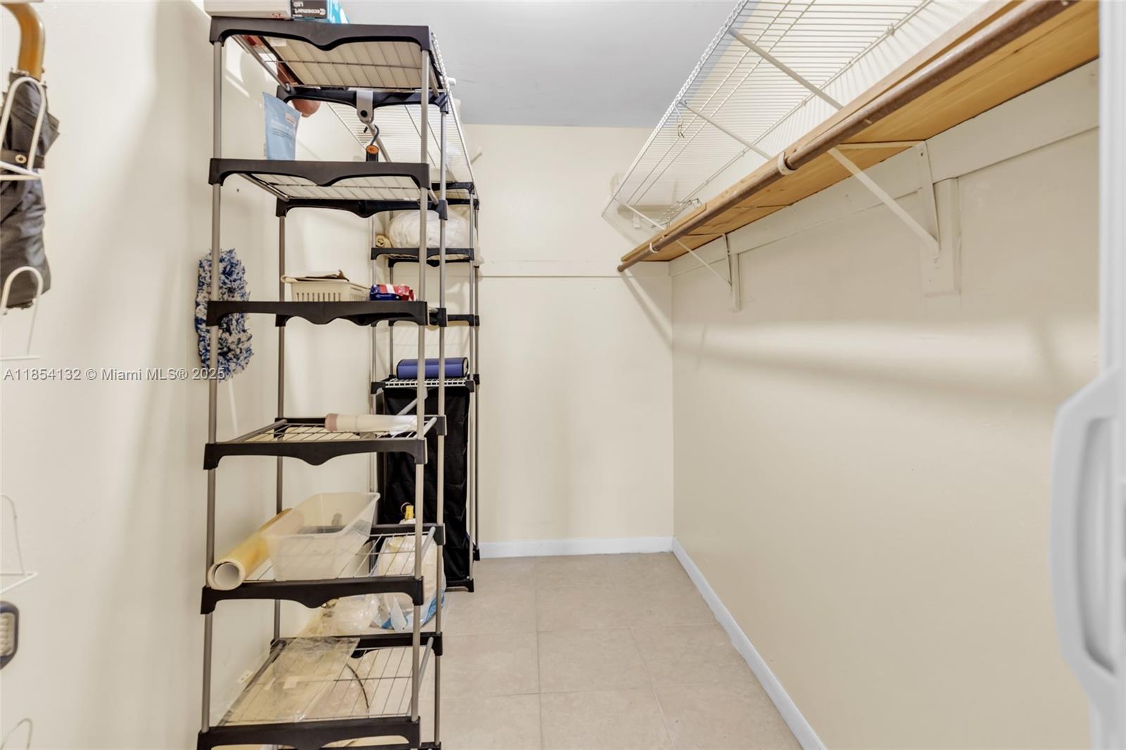 1855 West 62nd Street, Unit E306 Hialeah, FL 33012 - Photo 11 of 35 a view of entryway