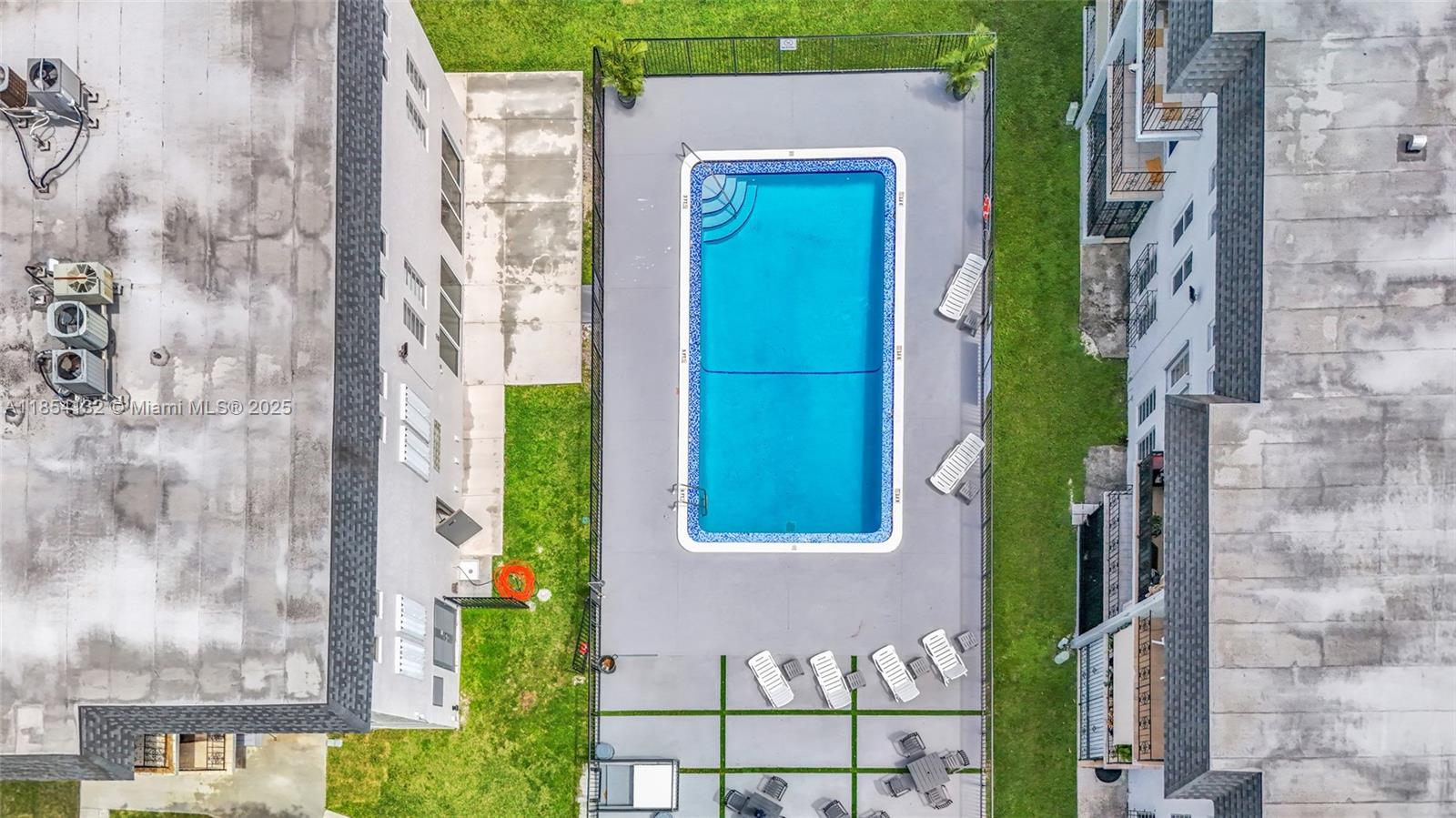 1855 West 62nd Street, Unit E306 Hialeah, FL 33012 - Photo 27 of 35 a view of a door front of a house