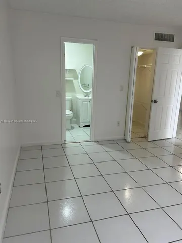 a view of a livingroom with wooden floor