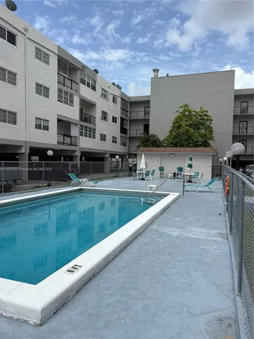 a view of building and yard