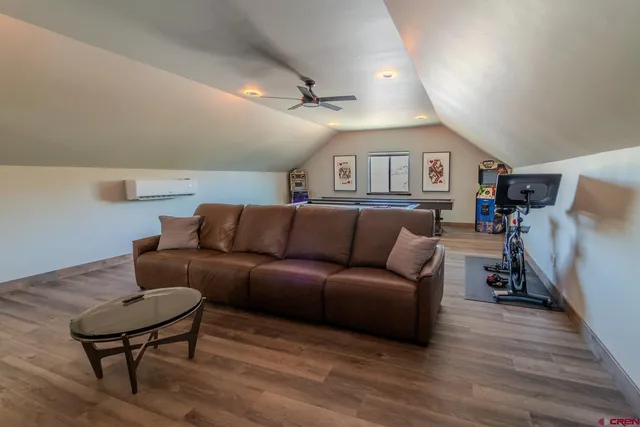 a view of a workspace with furniture