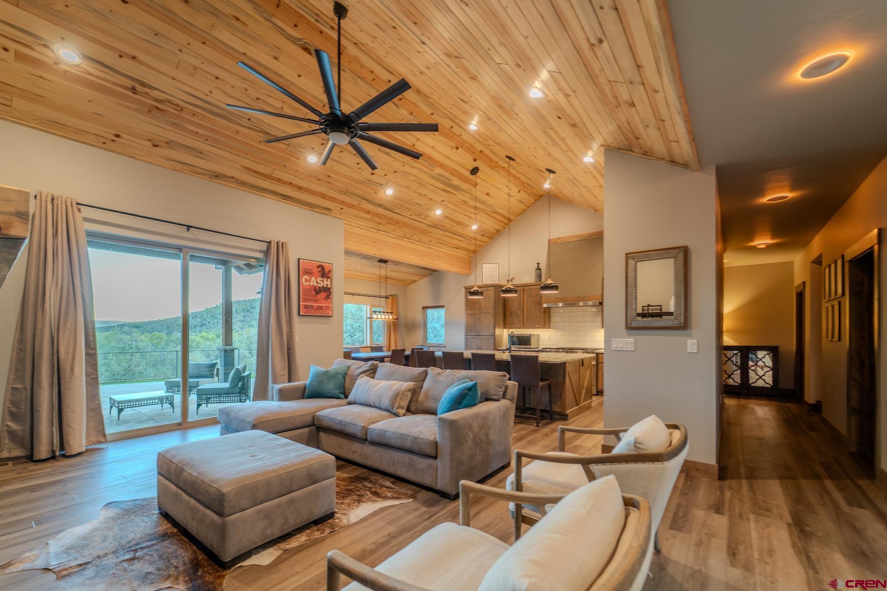 1700 Thoroughbred Road Durango, CO 81303 - Photo 9 of 45 a living room with furniture and a large window