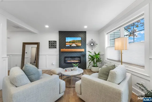 a kitchen with a refrigerator a sink and cabinets