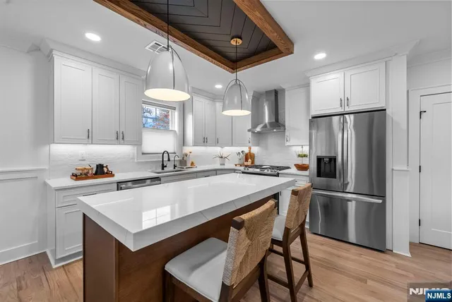 a view of a chairs on the roof deck