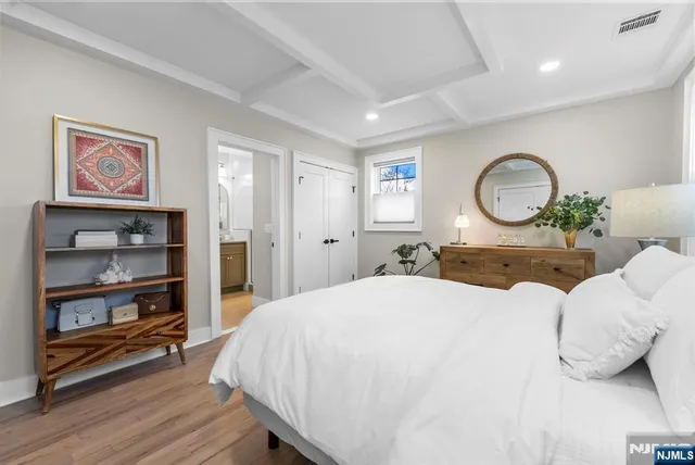 a view of a hallway with seating area