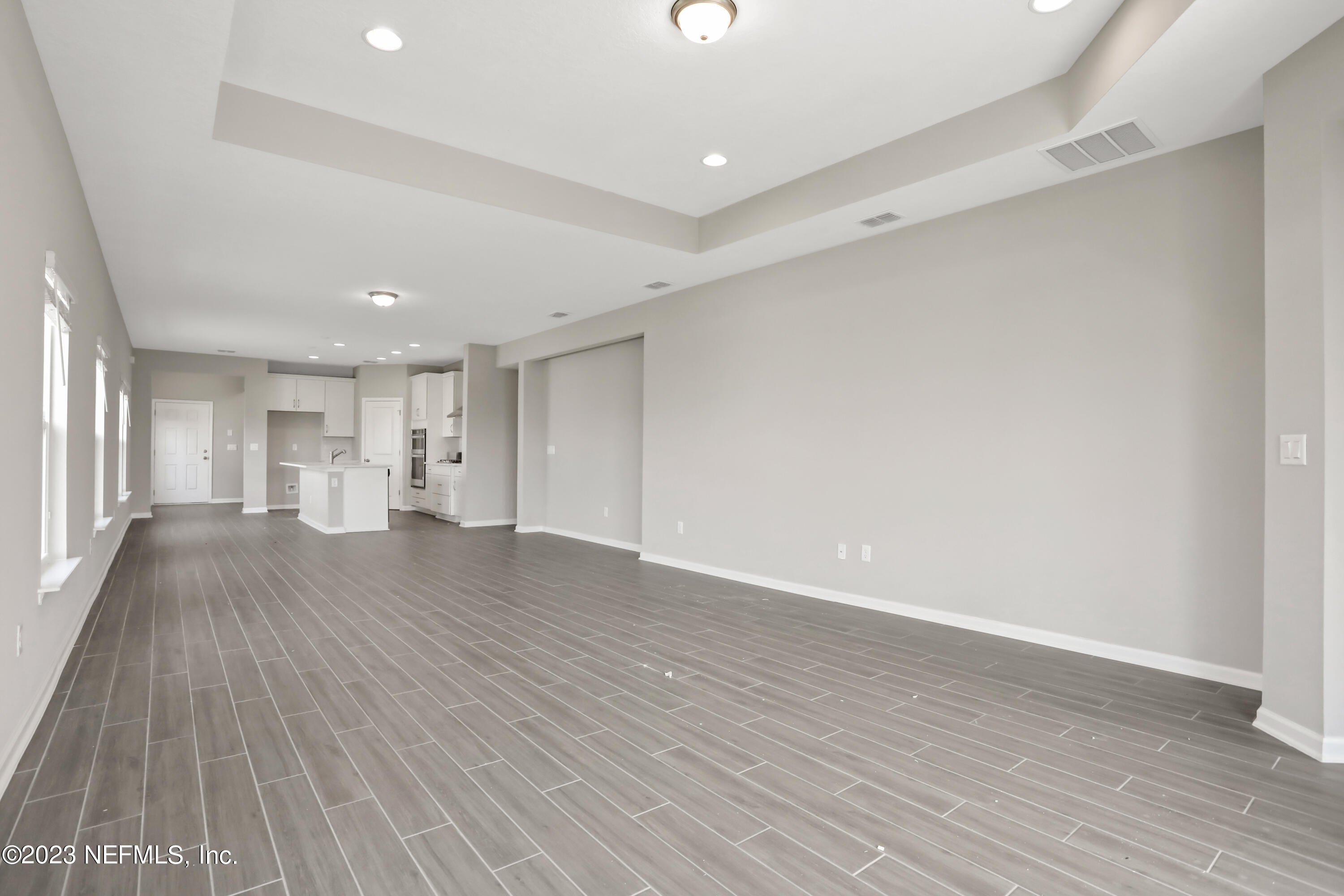 152 Torres Trace St. Augustine, FL 32095 - Photo 12 of 32 a view of empty room with wooden floor