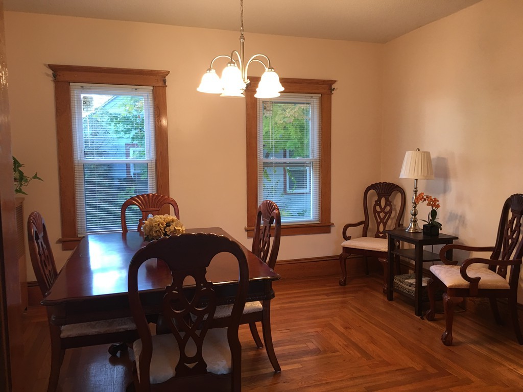 132 Windemere Street Springfield, MA 01104 - Photo 8 of 20 a view of a dining room with furniture and a chandelier