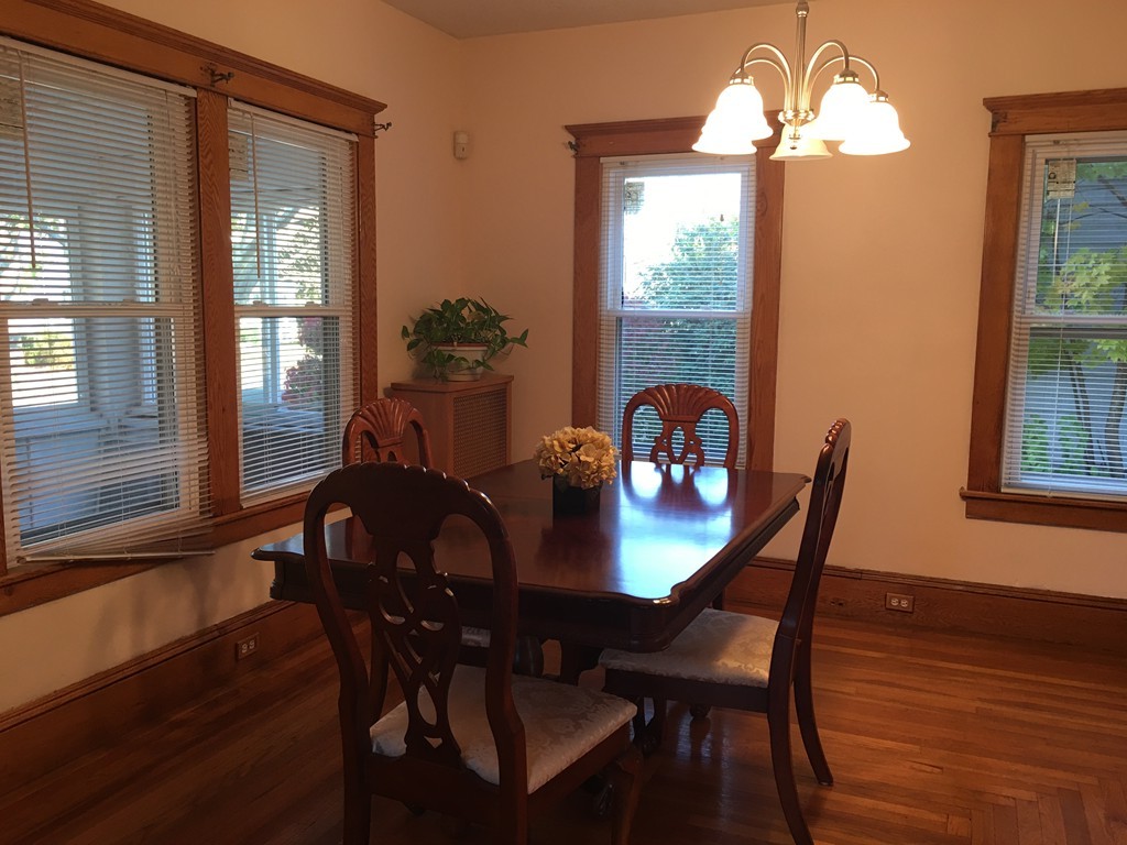 132 Windemere Street Springfield, MA 01104 - Photo 9 of 20 a view of a dining room with furniture window and wooden floor