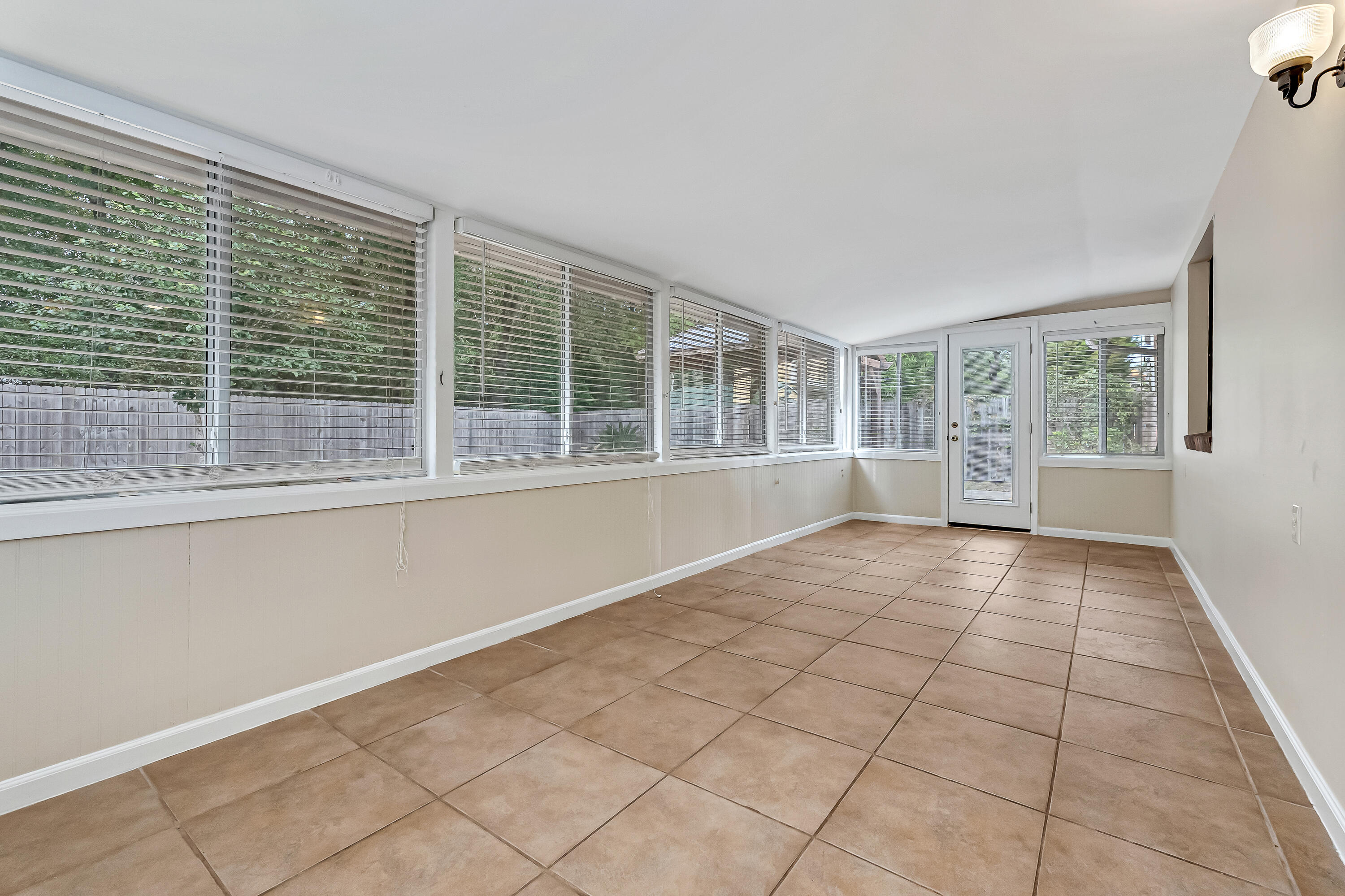 613 Caribbean Way Niceville, FL 32578 - Photo 21 of 27 a view of an empty room with a window