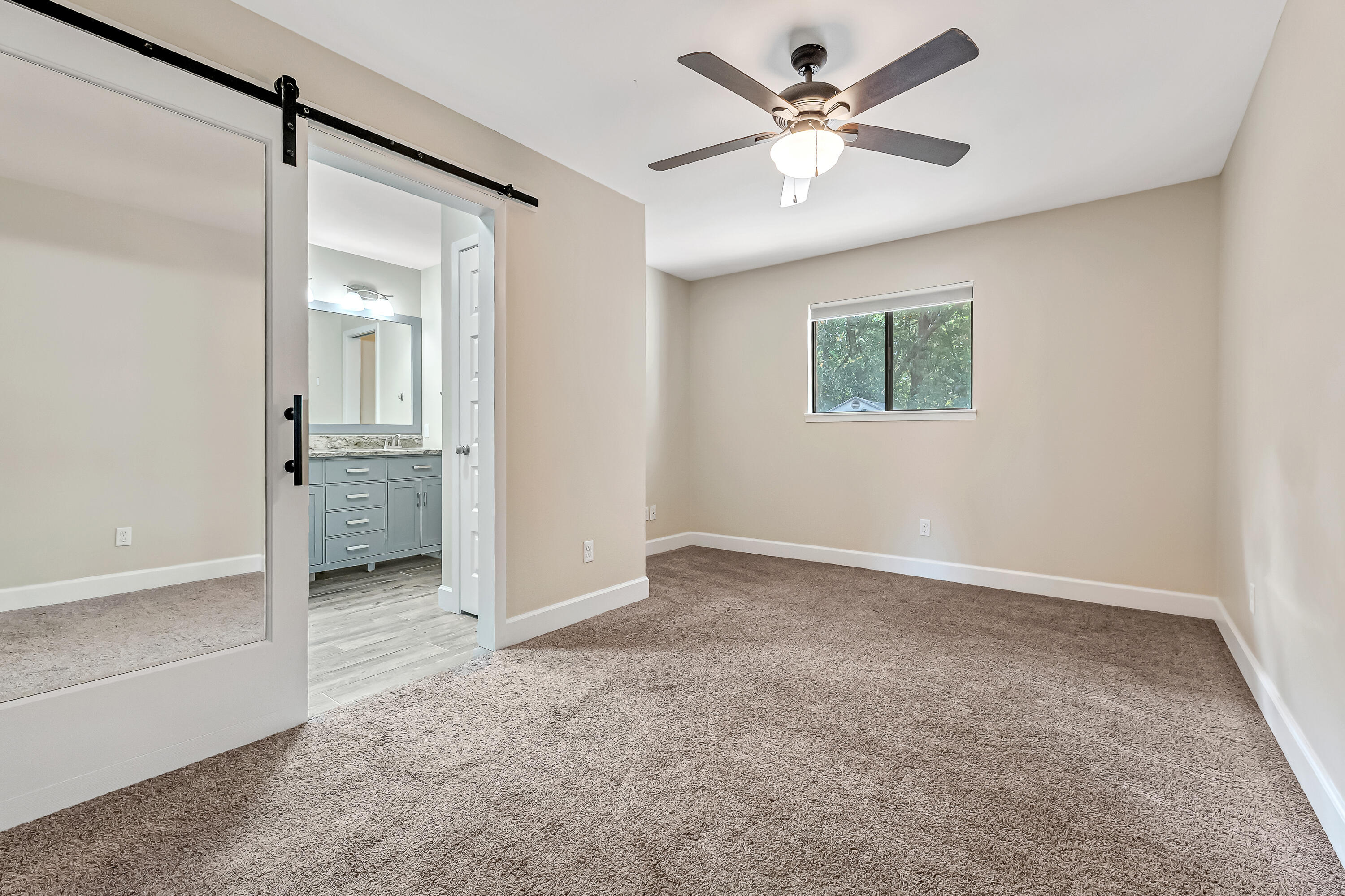 613 Caribbean Way Niceville, FL 32578 - Photo 6 of 27 a view of an empty room with a window