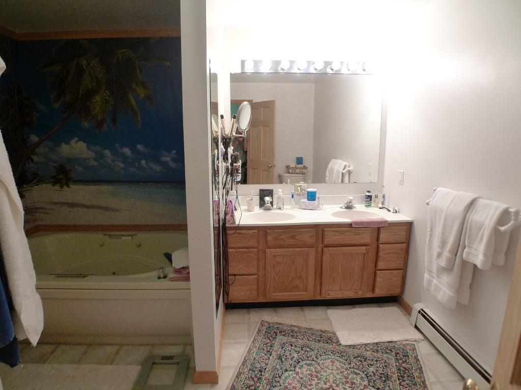 31 Forest Road Southport, ME 04576 - Photo 13 of 19 Master bath with double vanity and...