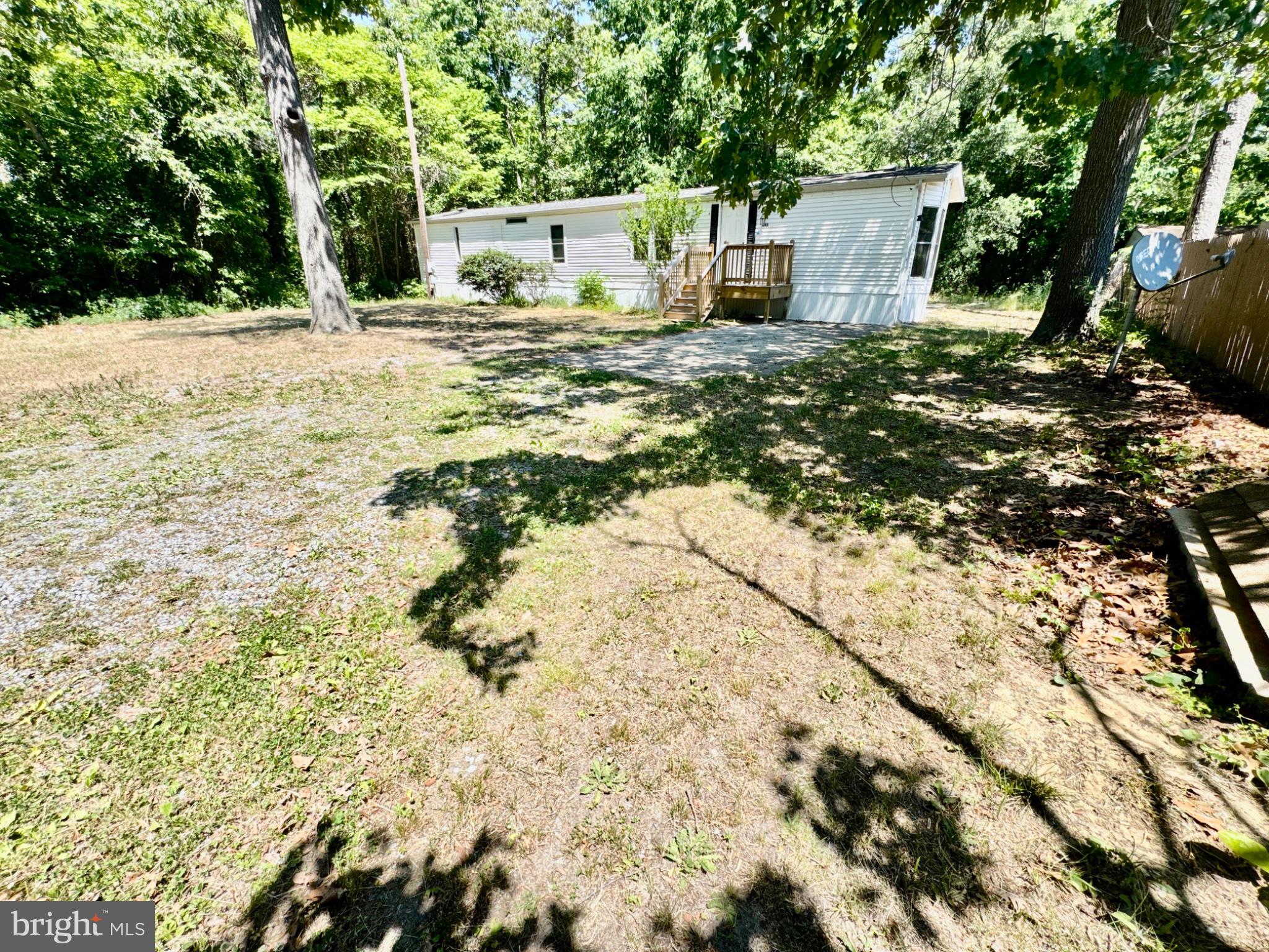 448 Evergreen Road Millville, NJ 08332 - Photo 3 of 25 a big yard with tree s