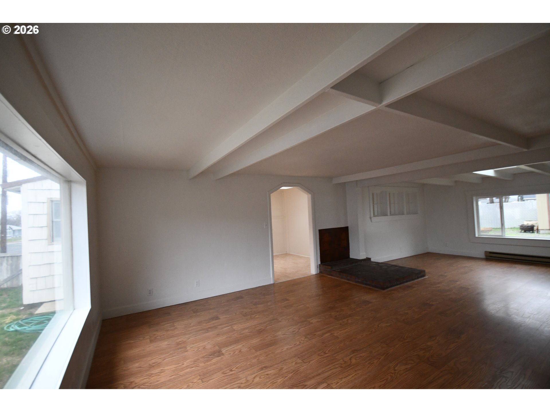 918 Snipes Street The Dalles, OR 97058 - Photo 11 of 47 a view of an empty room and window