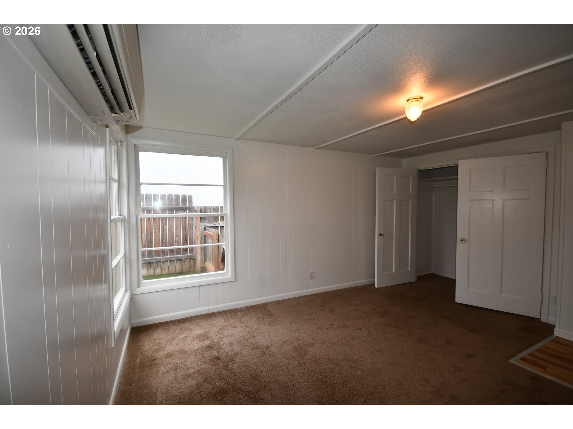 918 Snipes Street The Dalles, OR 97058 - Photo 24 of 47 a view of an empty room with a window