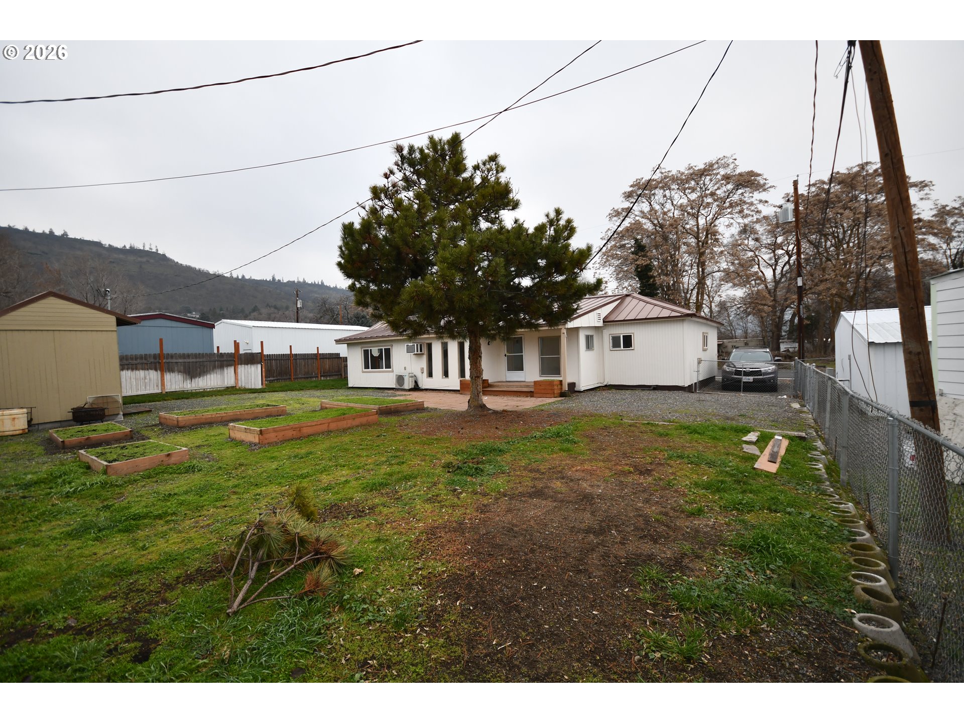 918 Snipes Street The Dalles, OR 97058 - Photo 38 of 47 a house view with a garden space