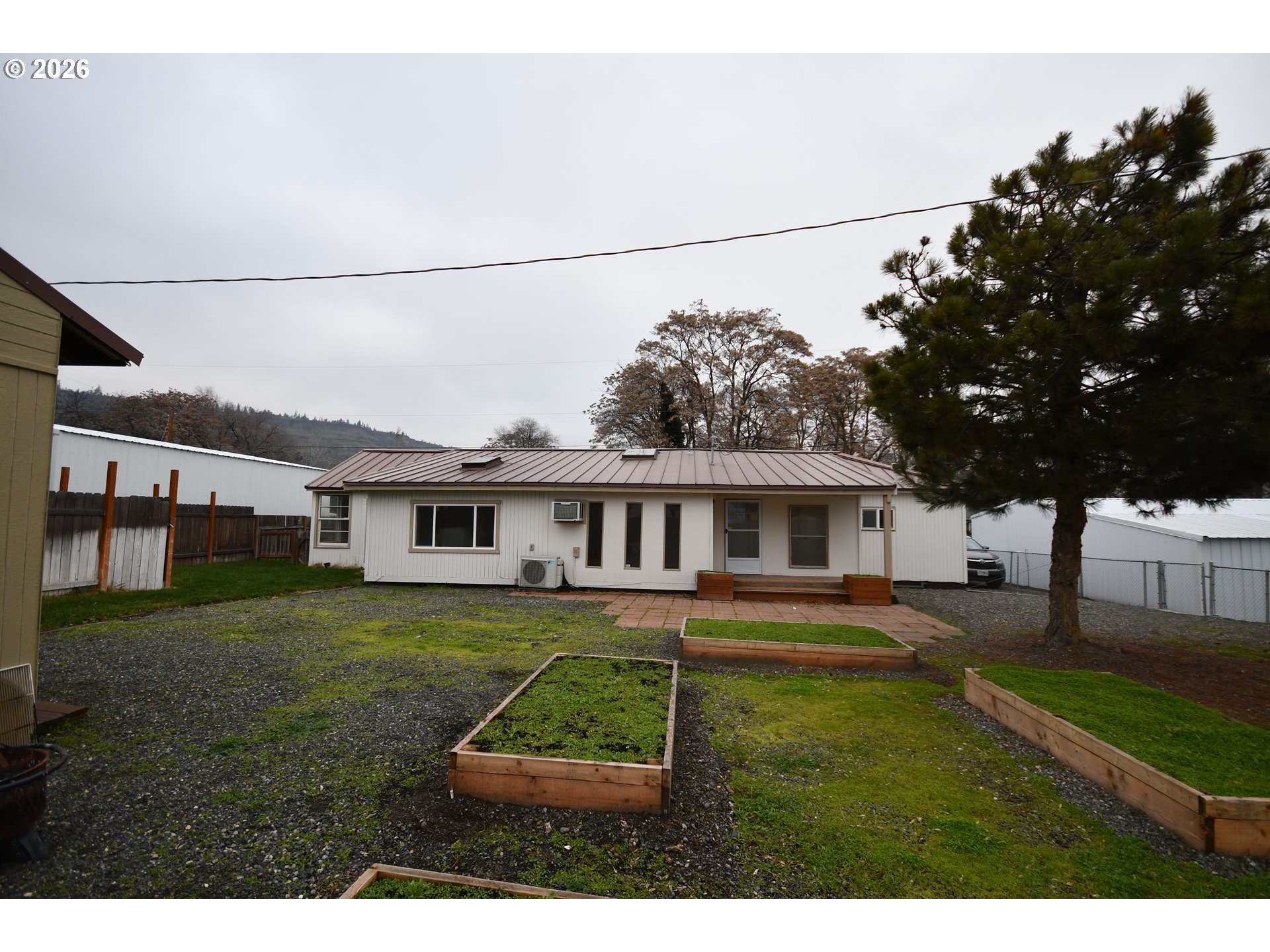 918 Snipes Street The Dalles, OR 97058 - Photo 40 of 47 a house view with a garden space