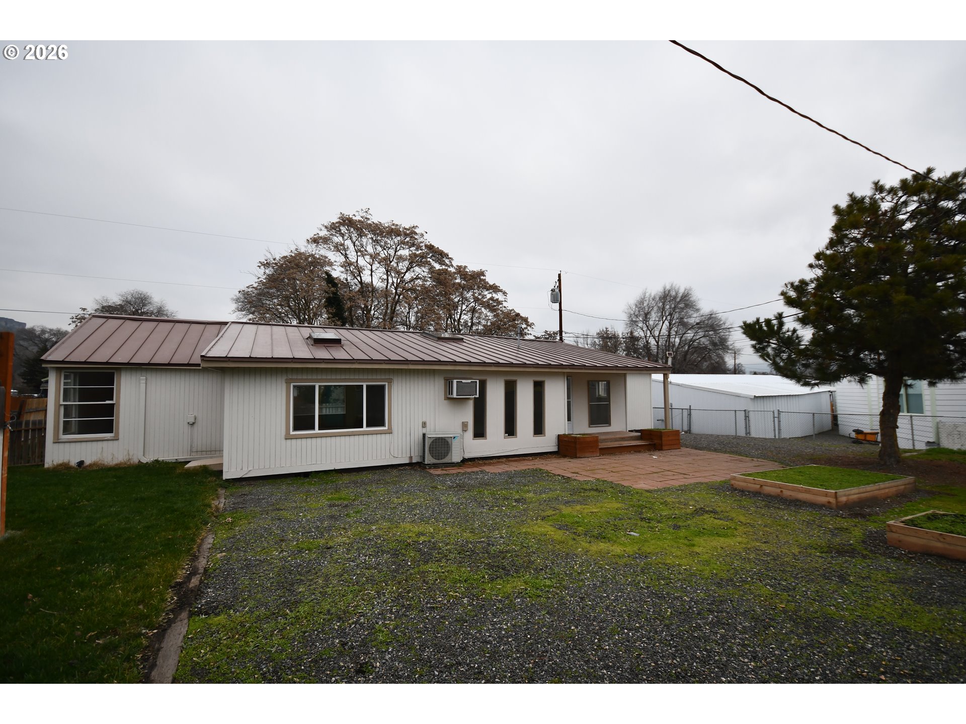 918 Snipes Street The Dalles, OR 97058 - Photo 42 of 47 a house view with a garden space