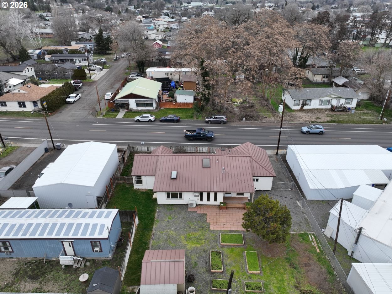 918 Snipes Street The Dalles, OR 97058 - Photo 5 of 47 an aerial view of multiple houses with yard