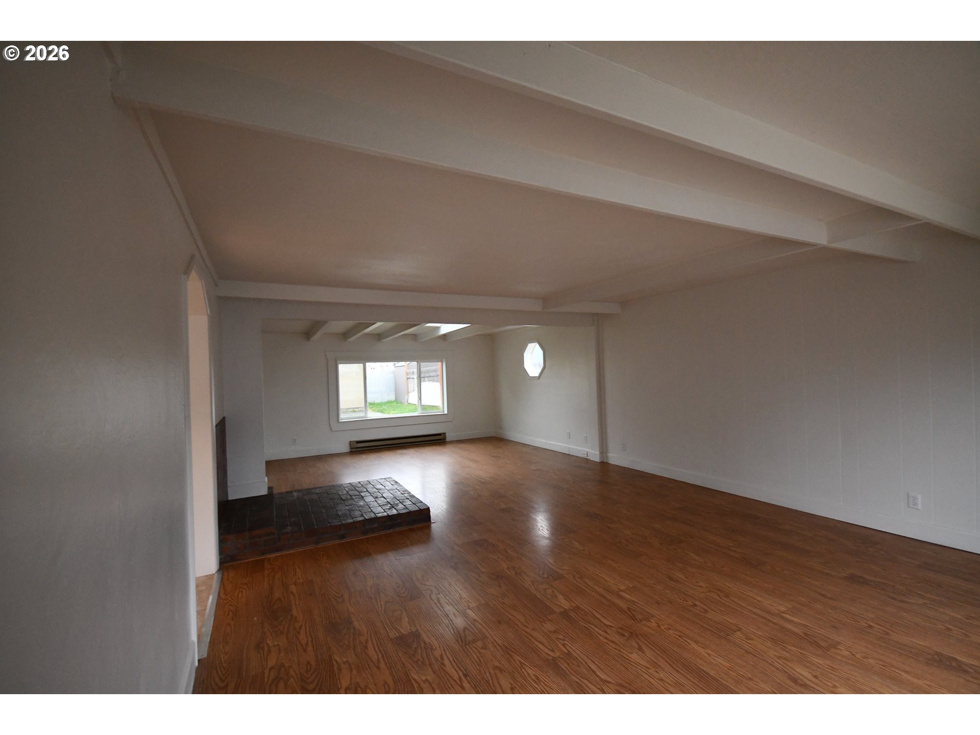 918 Snipes Street The Dalles, OR 97058 - Photo 9 of 47 a view of an empty room and window