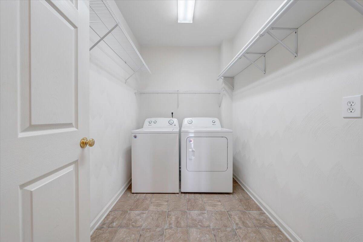 4448 Pheasant Ridge Road, Unit 307 Roanoke, VA 24014 - Photo 22 of 30 a utility room with dryer and washer