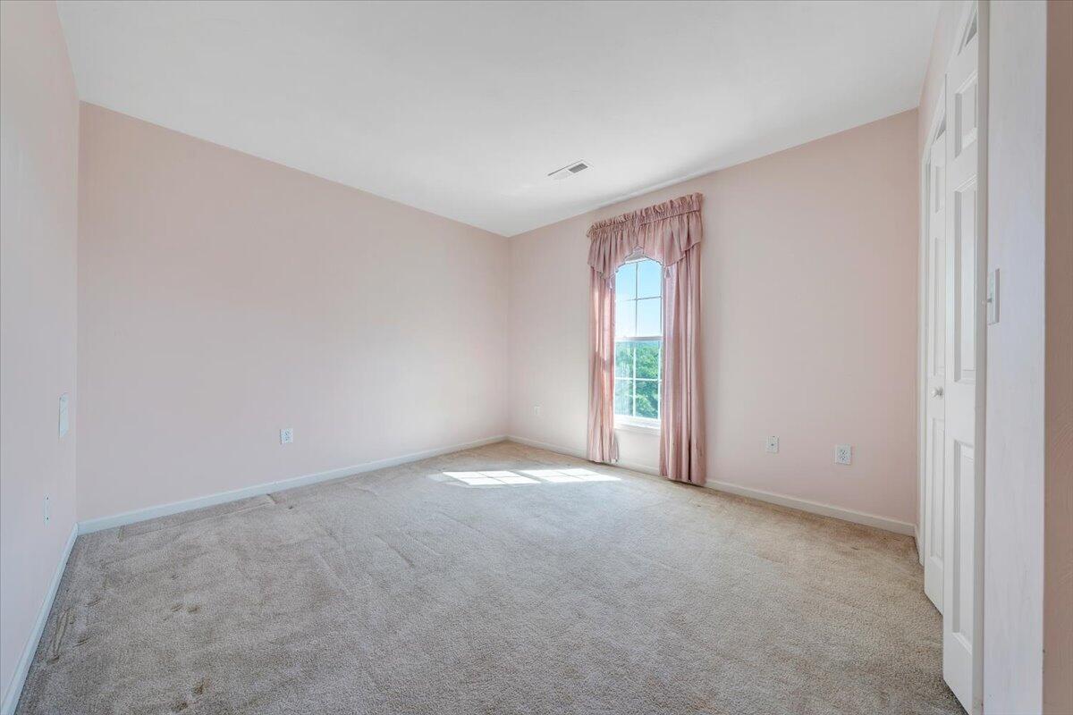 4448 Pheasant Ridge Road, Unit 307 Roanoke, VA 24014 - Photo 24 of 30 a view of an empty room with a window