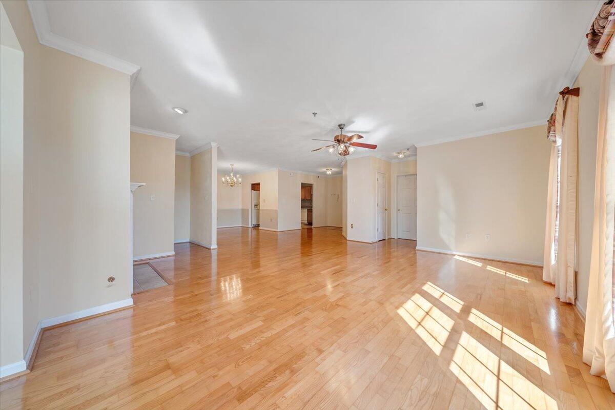 4448 Pheasant Ridge Road, Unit 307 Roanoke, VA 24014 - Photo 4 of 30 a view of an empty room with wooden floor