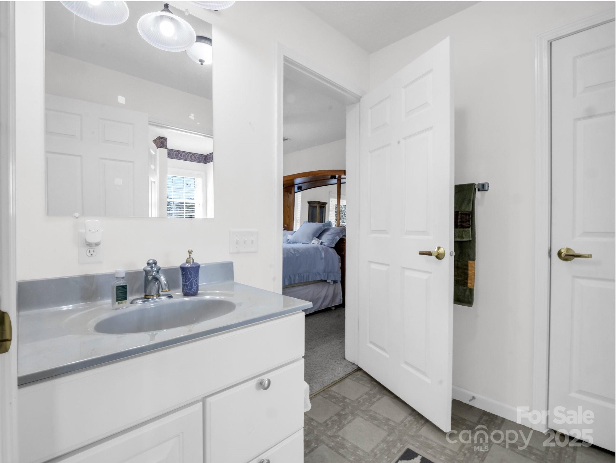 532 Harvey Logan Road Bostic, NC 28018 - Photo 40 of 48 a bathroom with a sink and a mirror