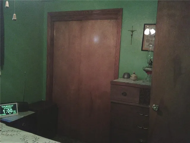 a bathroom with a shower and a sink