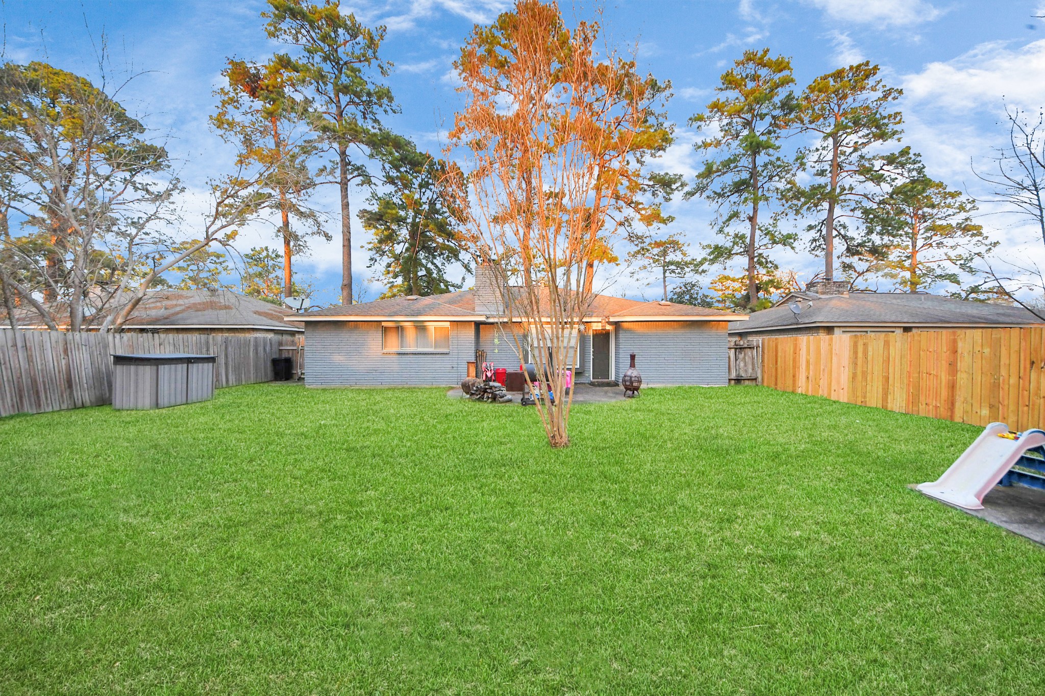 23127 Harpergate Drive Spring, TX 77373 - Photo 30 of 43 a view of house with backyard