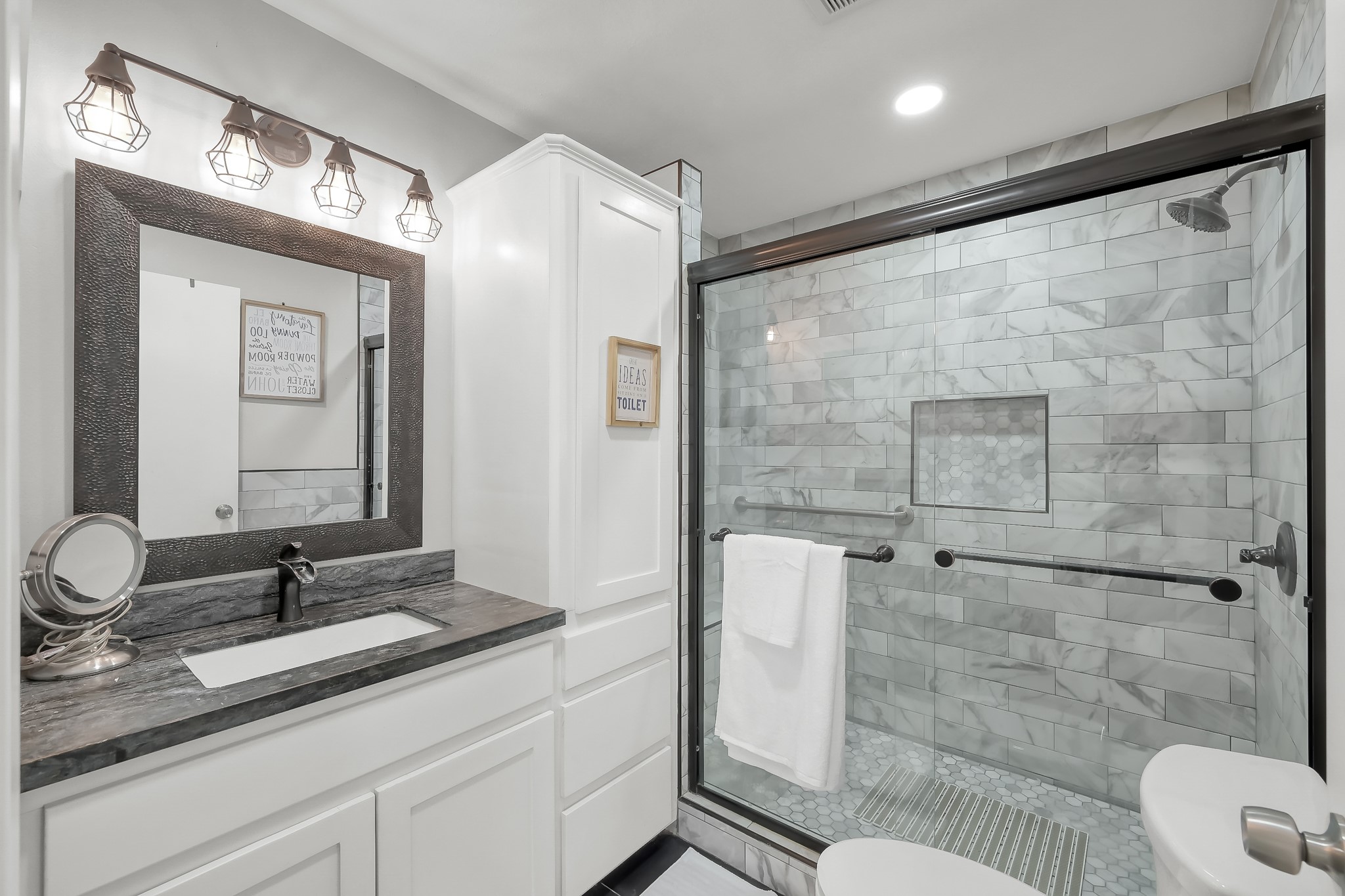 329 Sassafras Drive Trinity, TX 75862 - Photo 32 of 48 a bathroom with a granite countertop sink toilet and shower