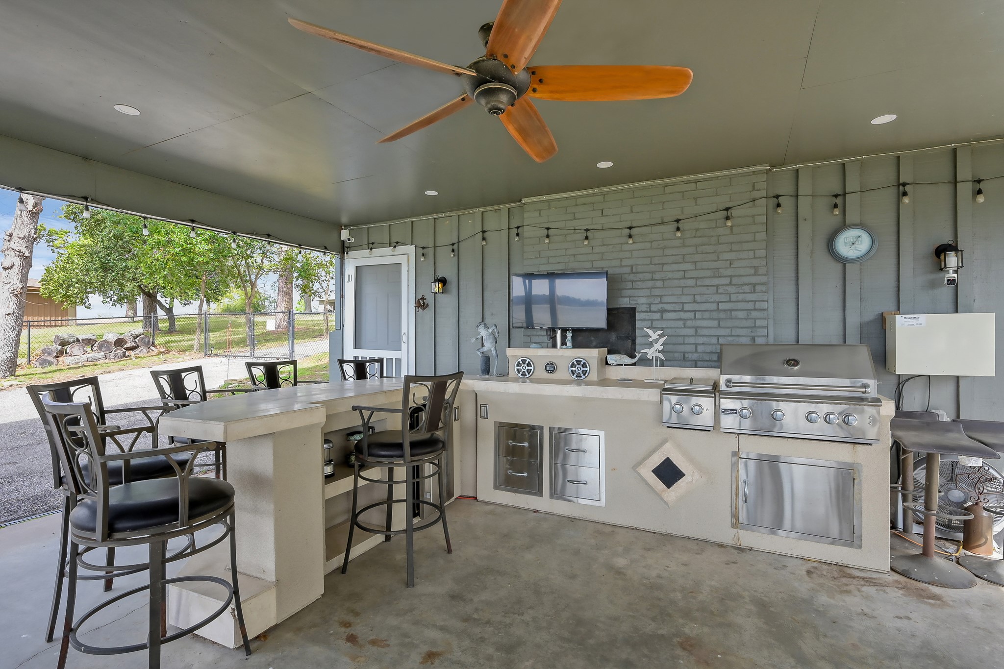 329 Sassafras Drive Trinity, TX 75862 - Photo 37 of 48 a kitchen with stainless steel appliances granite countertop a stove and a refrigerator